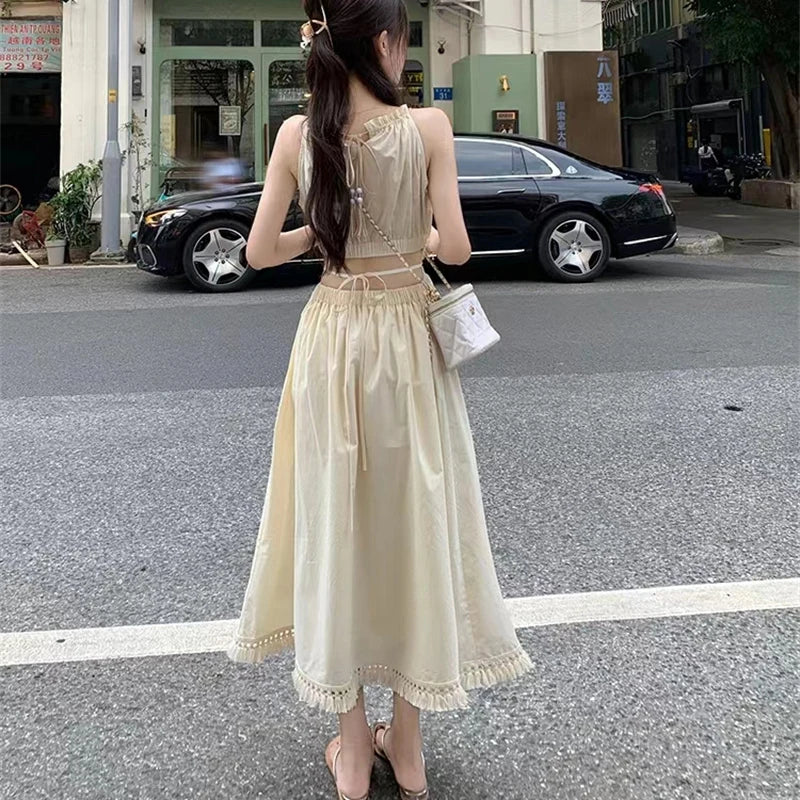 Fashion and Casual Summer Halter Hollow Sleeveless Tassel Solid Color Simple and Generous Hem Holiday Beach Women's Long Dress - Seprincess