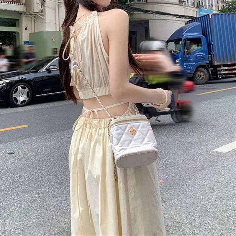 Fashion and Casual Summer Halter Hollow Sleeveless Tassel Solid Color Simple and Generous Hem Holiday Beach Women's Long Dress - Seprincess