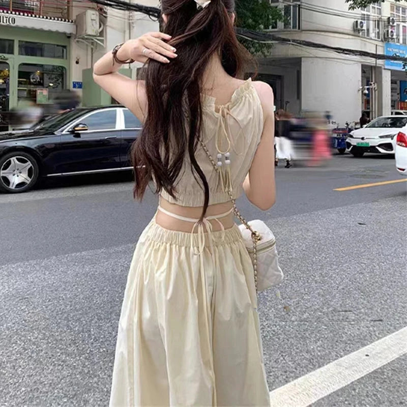 Fashion and Casual Summer Halter Hollow Sleeveless Tassel Solid Color Simple and Generous Hem Holiday Beach Women's Long Dress - Seprincess