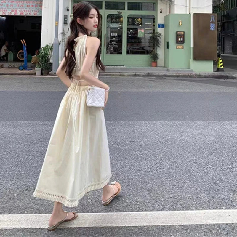 Fashion and Casual Summer Halter Hollow Sleeveless Tassel Solid Color Simple and Generous Hem Holiday Beach Women's Long Dress - Seprincess